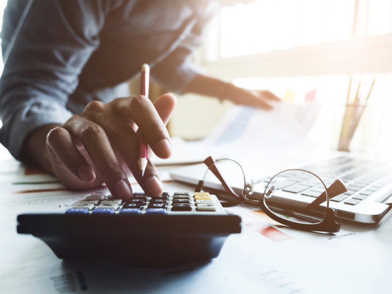 Close Up Of Businessman Or Accountant Hand Holding Pen Working